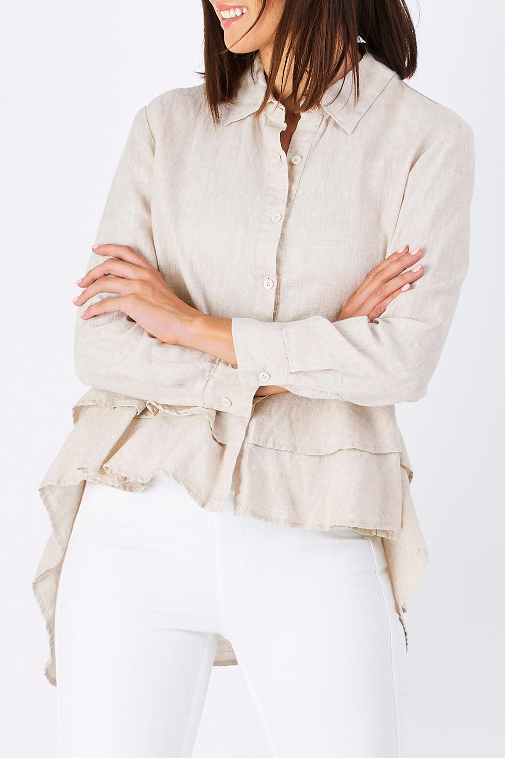 Model Perrie wearing size S of the Peplum Top in colour Natural, from the front, cropped image