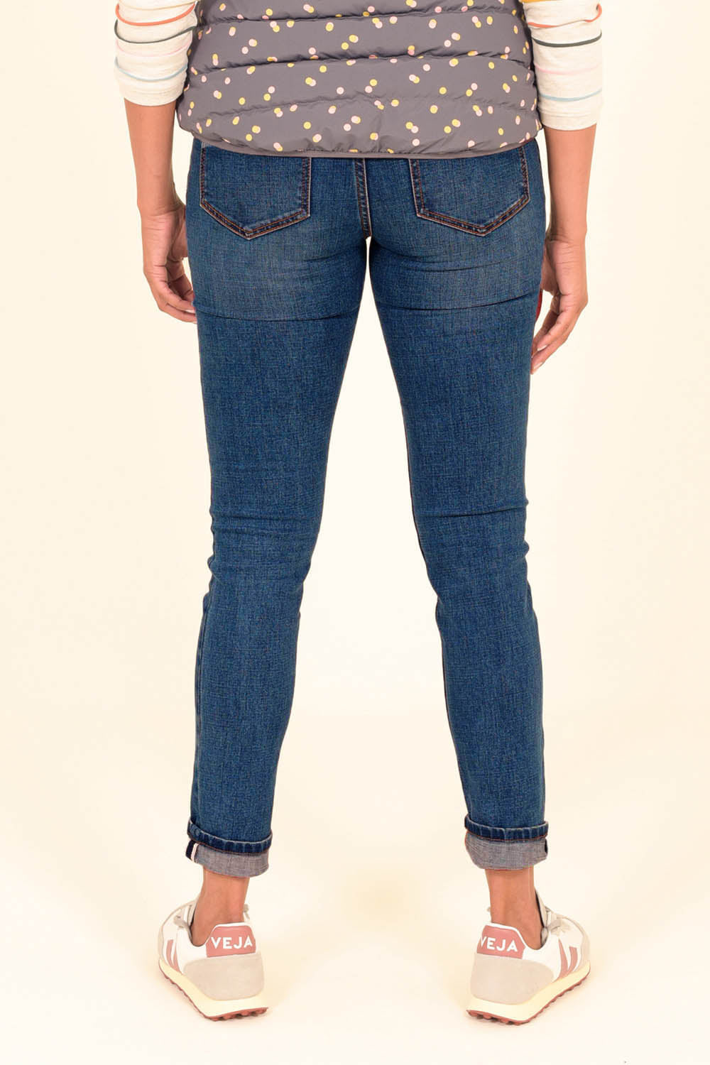 A model wearing the Preloved Skinny Jean in colour Blue (Blue), from the back