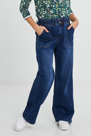 Model Katie wearing size 10 of the Wide Leg Jeans in colour Blue (Blue), from the front, cropped image