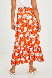 Model Olivia wearing size S of the Free Love Skirt in colour Sundance, from the back