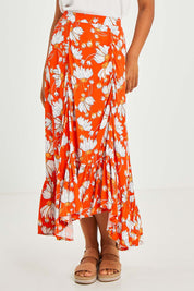 Model Olivia wearing size S of the Free Love Skirt in colour Sundance, from the front, cropped image