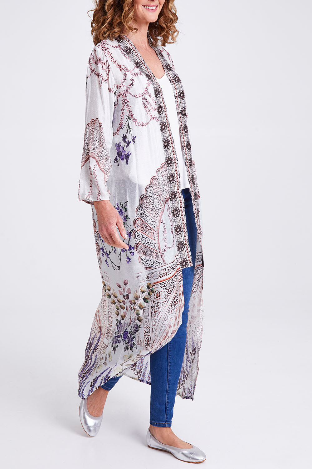 Model Emma wearing the Lavender Duster in colour Lavender (White), from the front, cropped image