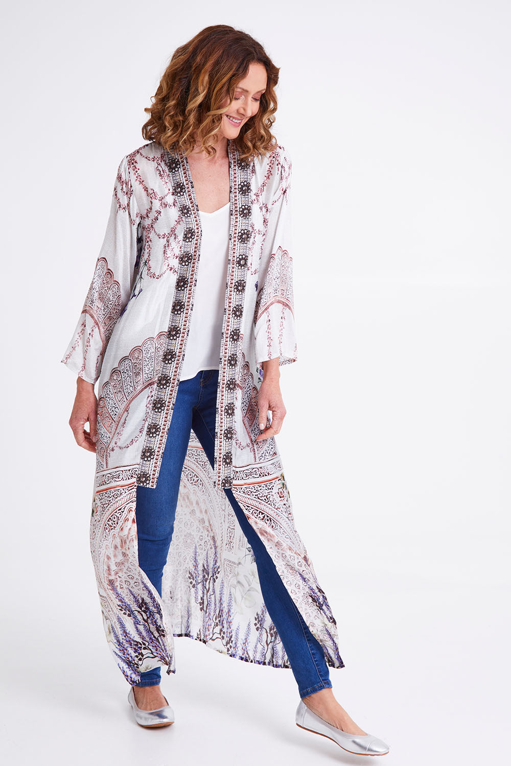 Model Emma wearing the Lavender Duster in colour Lavender (White), from the front, showing the whole outfit
