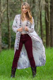 A model wearing the Lavender Duster in colour Lavender (White), from the front, showing the whole outfit