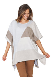 A model wearing the Geo Kaftan in colour Silver (Grey), from the front, showing the whole outfit