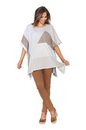 A model wearing the Geo Kaftan in colour Silver (Grey), from the front, showing the whole outfit