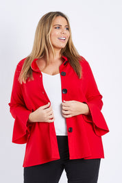 Model Fiona wearing size XL of the Crimson Button Jacket in colour Red (Red), from the front, cropped image