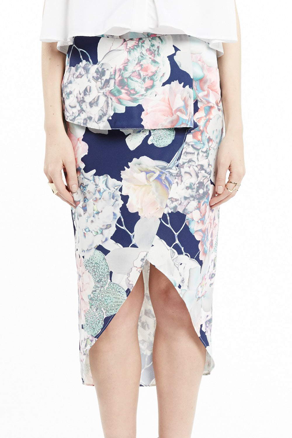 A model wearing the Gypset Wanderer Skirt in colour Print (Blue), from the front, cropped image