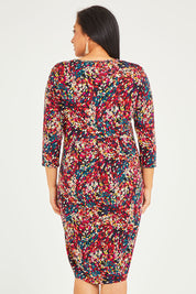 Model Terri-Leigh wearing size 14 of the Box Pleat Dress in colour Multiprint (Black), from the back