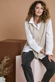 Model Emma wearing size S of the Cleo Vest in colour Oat, from the front, showing the whole outfit