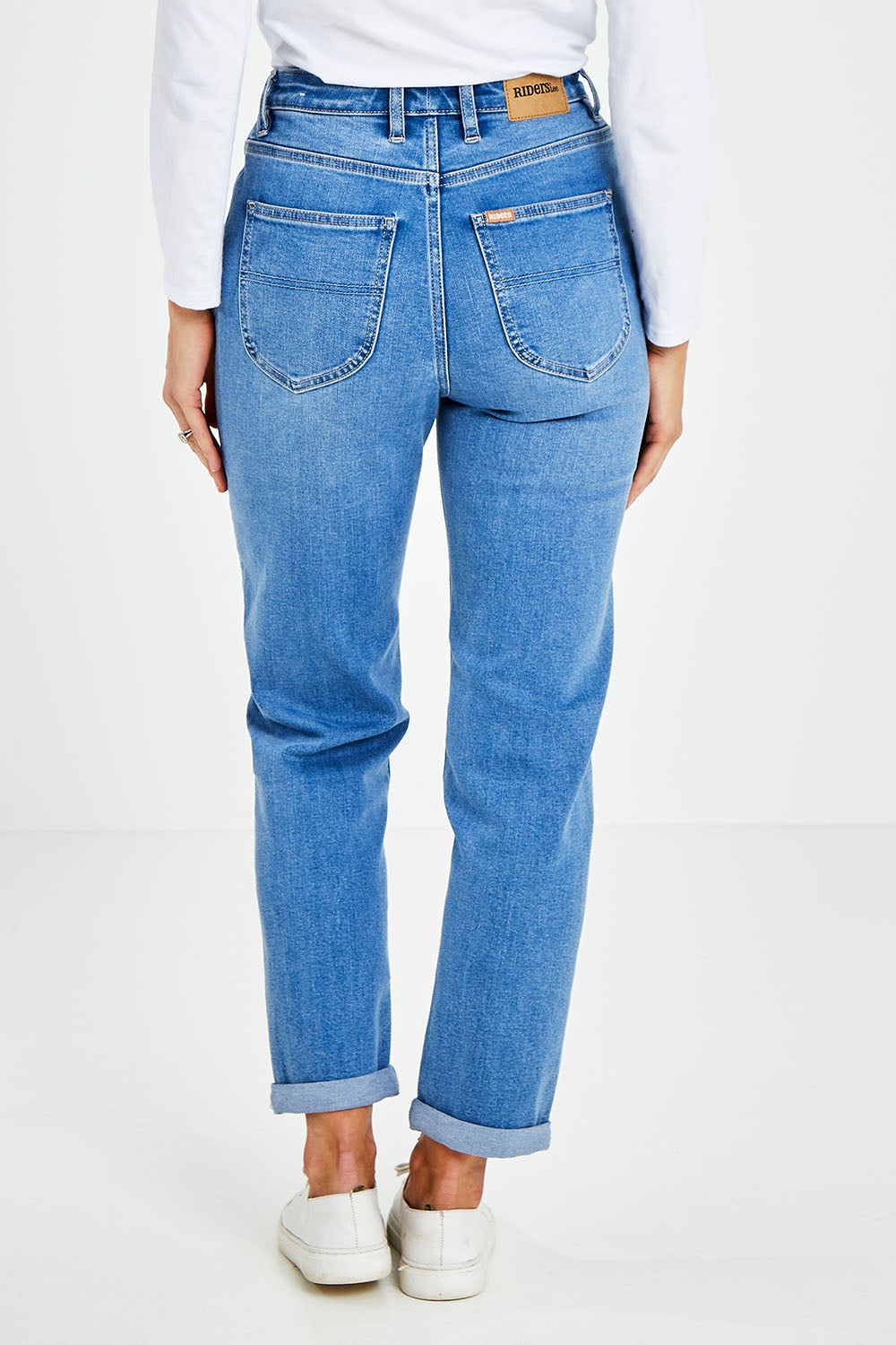 Model Kelly wearing size 10 of the Hi Mom Curve in colour Blissblue (Blue), from the back