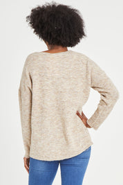 Model Aiyana wearing size S of the Verity V Neck Knit in colour Oatmeal, from the back