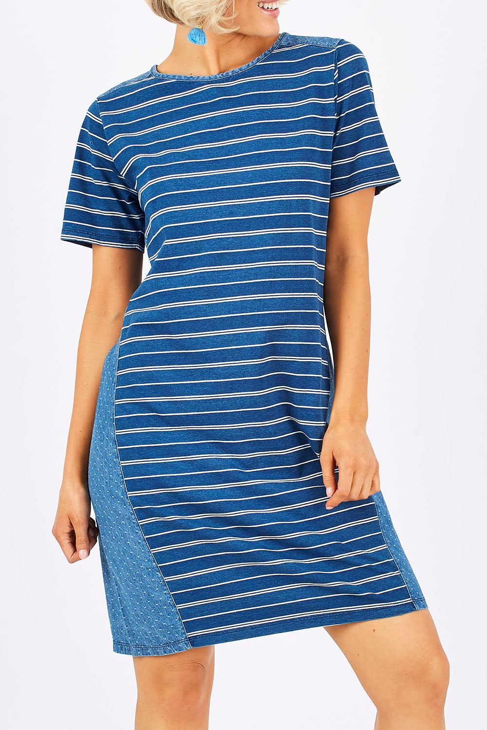 Model Emma wearing size 10 of the Frankie Dress in colour Indigo (Blue), from the front, cropped image