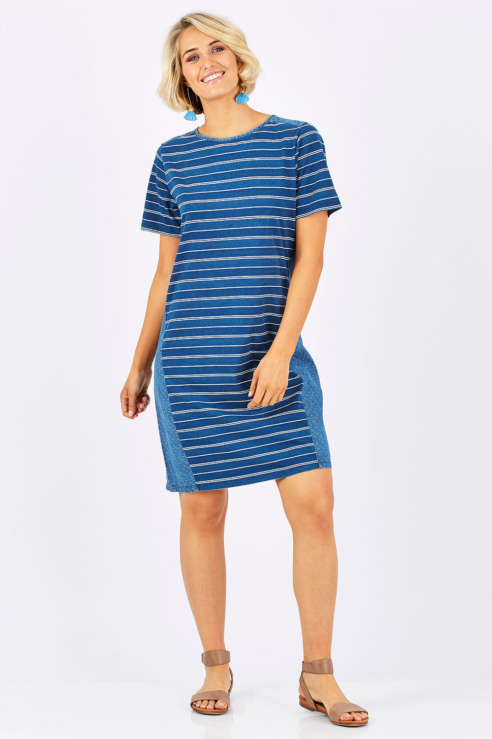 Model Emma wearing size 10 of the Frankie Dress in colour Indigo (Blue), from the front, showing the whole outfit