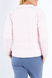 Model Bianca wearing size 10 of the Madison Zip Rugby in colour Peonypink (Pink), from the back