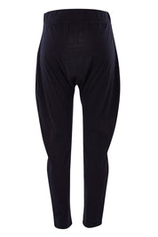 Product shot of the Fundamental Weekend Pant in colour Black (Black), from the back