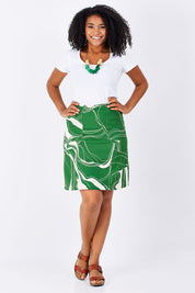 Model Grazi wearing size S of the Pocket Skirt in colour GreenNatur (Green), from the front, showing the whole outfit