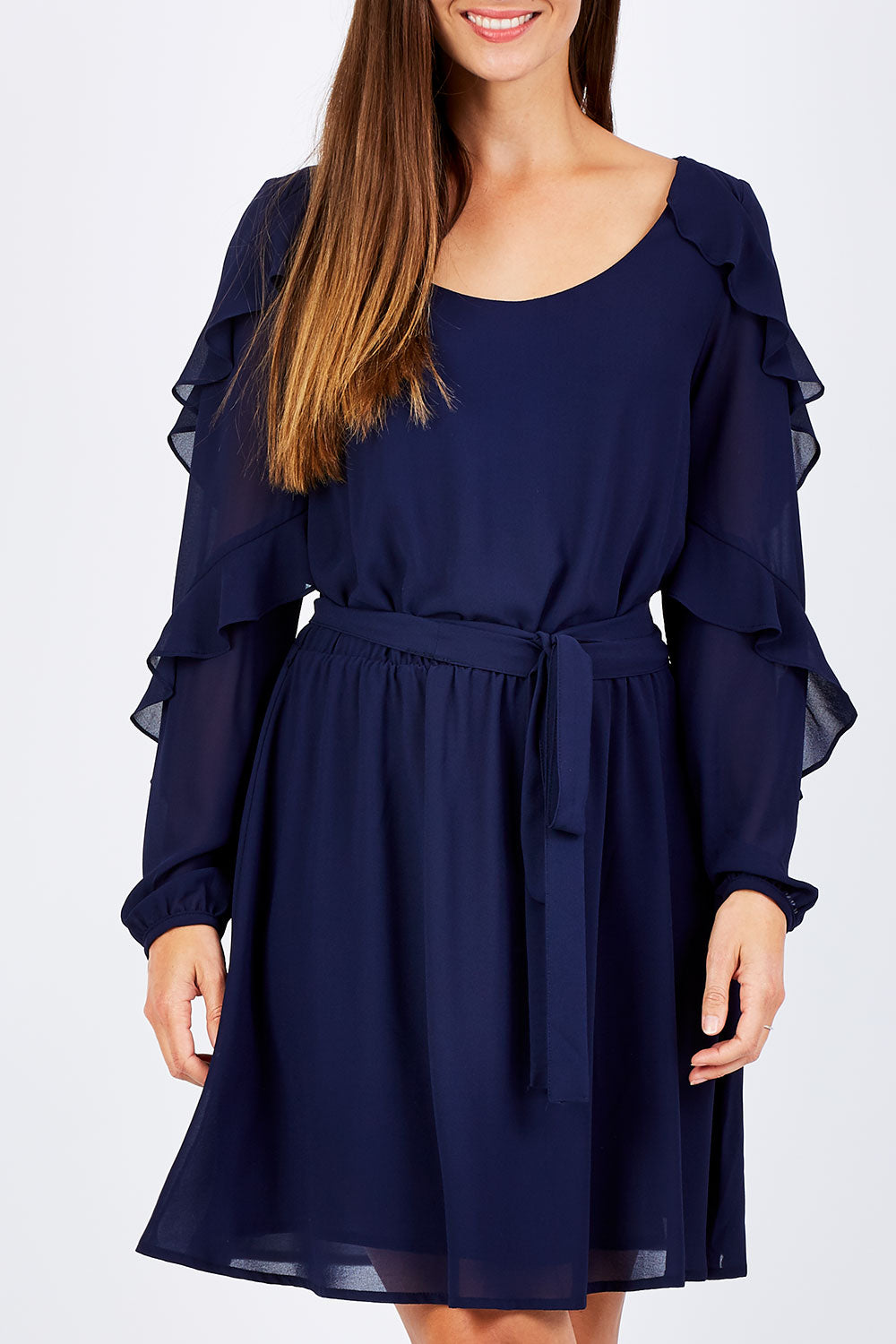 Model Anna wearing size 10 of the Eugenie Dress in colour Ink (Blue), from the front, cropped image