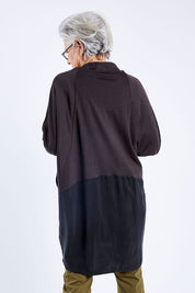 Model Elise wearing size S of The Break Out Cardi in colour Espressobl (Black), from the back