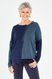 Model Elise wearing size S of the Two Times The Fun Merino Sweater in colour Navyspear (Blue), from the front, cropped image