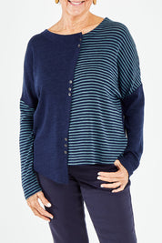 Model Elise wearing size S of the Two Times The Fun Merino Sweater in colour Navyspear (Blue), from the front, cropped image
