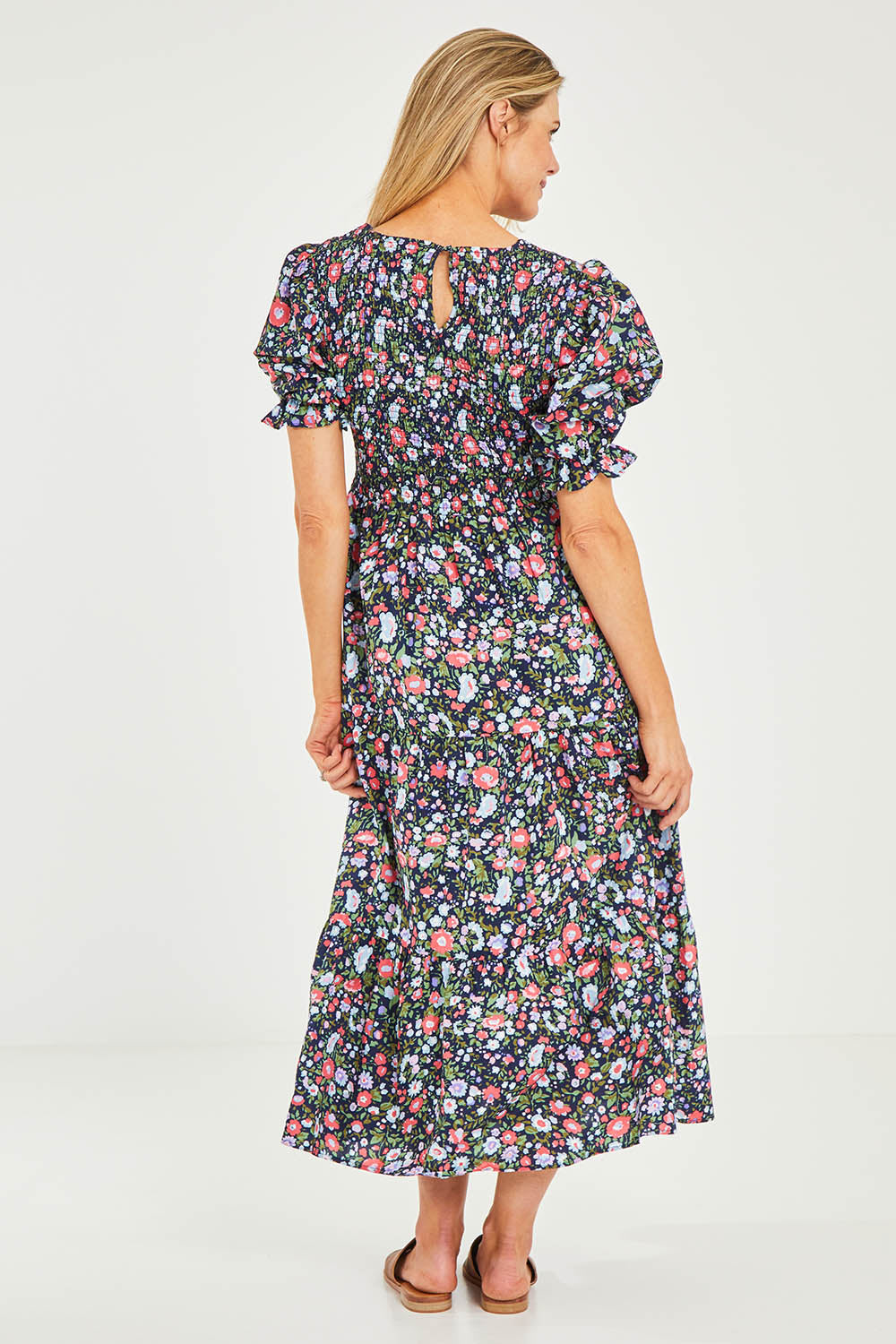 Model Kelly wearing size 10 of the Rock The Smock Dress in colour Navymeadow (Blue), from the back
