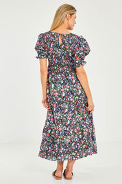 Model Kelly wearing size 10 of the Rock The Smock Dress in colour Navymeadow (Blue), from the back