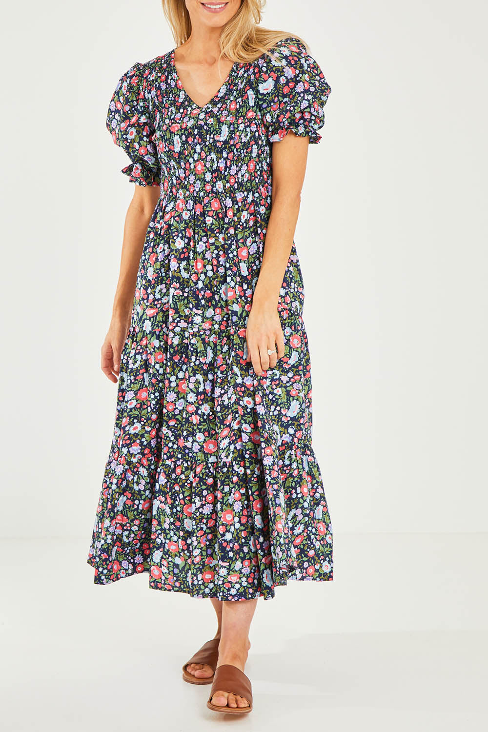 Model Kelly wearing size 10 of the Rock The Smock Dress in colour Navymeadow (Blue), from the front, cropped image