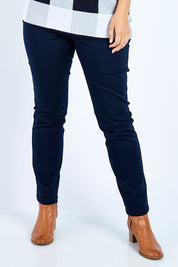 Model Jess wearing size 14 of the Hit Refresh Luxe Jeggings in colour Indigo (Blue), from the front, cropped image