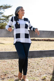 Model Nadine wearing size 10 of the Hit Refresh Luxe Jeggings in colour Indigo (Blue), from the front, showing the whole outfit