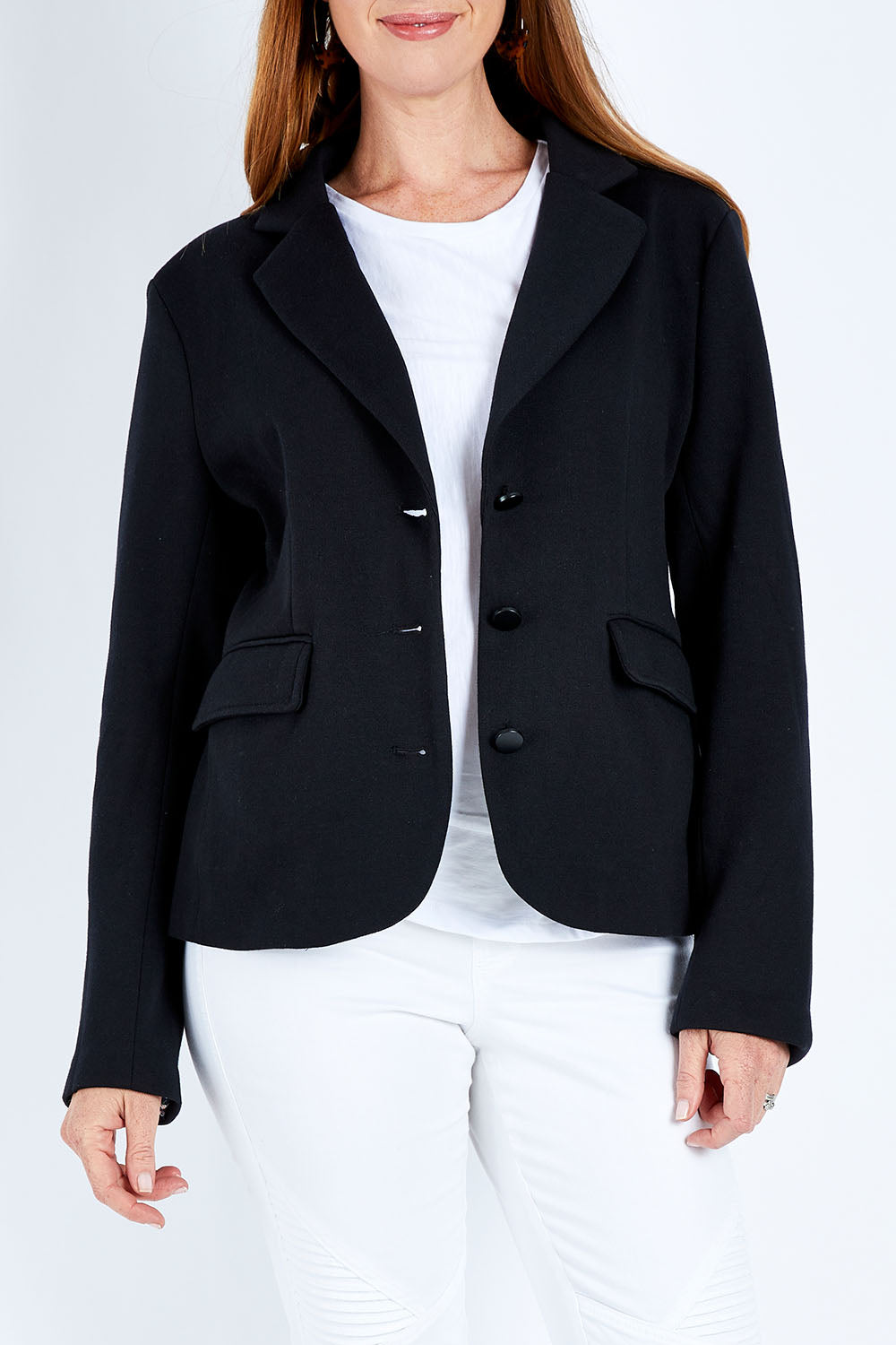 Model Katie wearing size 10 of the Elements Zinnia Blazer in colour Black (Black), from the front, cropped image
