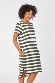 Model Olivia wearing size 10 of the Elements Bayley Dress in colour Khakstripe (White), from the front, cropped image
