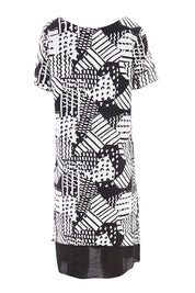 Product shot of the Patterned Dress in colour BlackWhite (Black), from the back