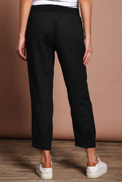 Model Madeline wearing size 10 of the Pull On Linen Pant in colour Black (Black), from the back