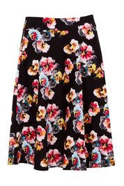 Product shot of the Printed Swing Skirt in colour Comical (Black), from the front