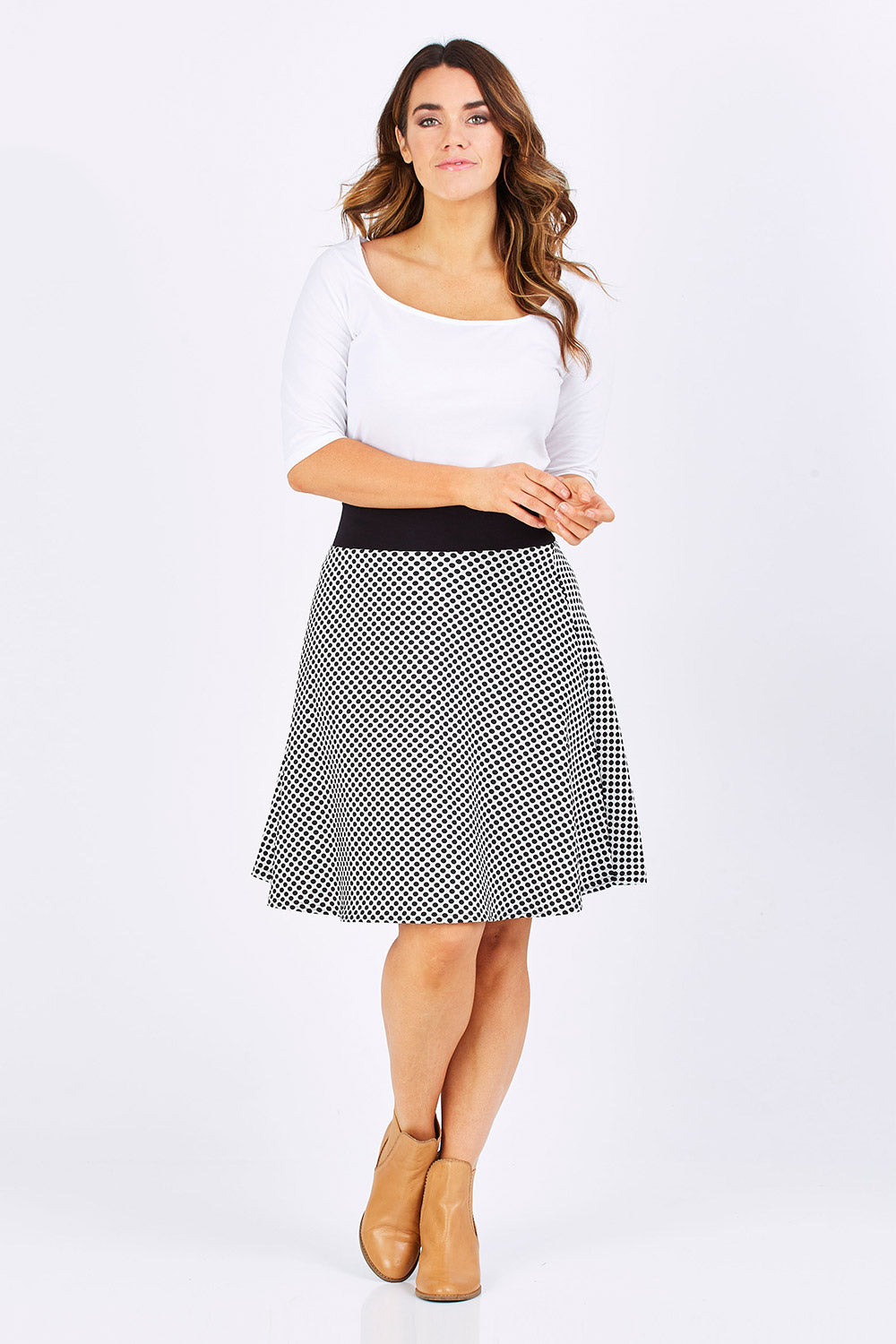 Model Laura wearing size 12 of the Spotted A Line Skirt in colour Spotted (White), from the front, showing the whole outfit
