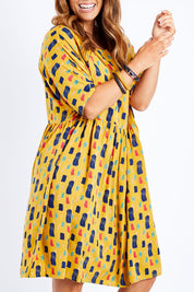 Model Laura wearing size 14 of the High Waist Relaxed Dress in colour Painting, from the front, cropped image