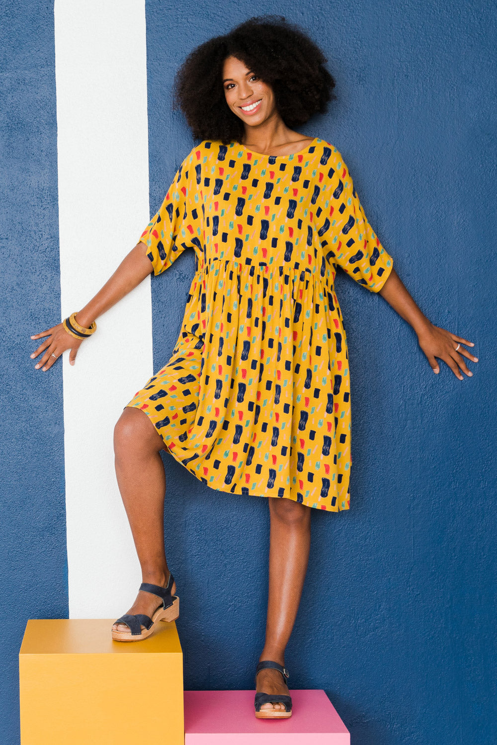 Model Schanez wearing size 10 of the High Waist Relaxed Dress in colour Painting, from the front, showing the whole outfit