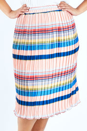 Model Lauren wearing size 18 of the Pleated Stripe Skirt in colour Pleated (Pink), from the front, cropped image