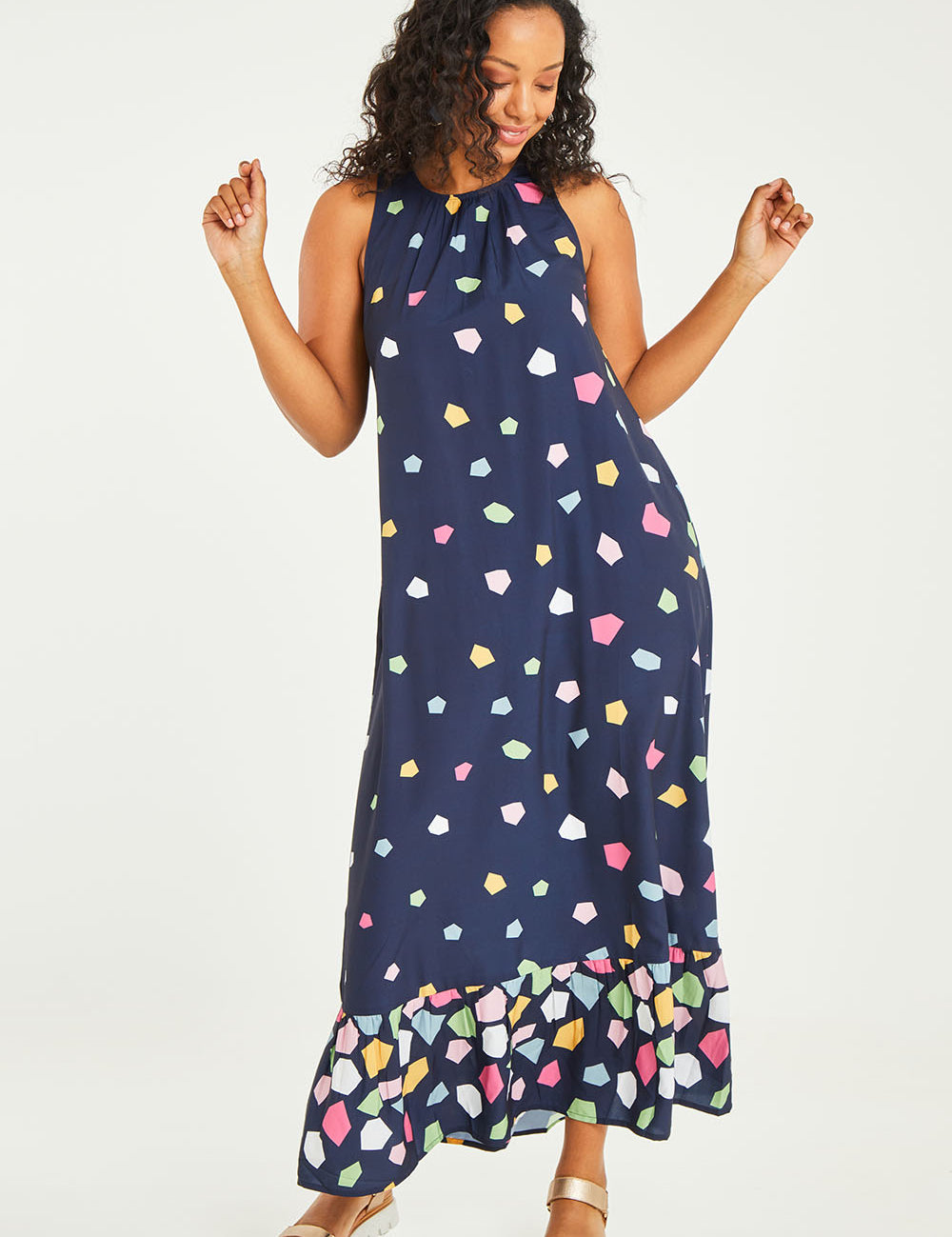 Model Noli wearing size 14 of the Falling Bricks Maxi in colour Jigsaw (Blue), from the front, showing the whole outfit