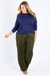 Model Fiona wearing size 16 of the Printed Wide Leg Pant in colour Mustspots (Black), from the front, showing the whole outfit