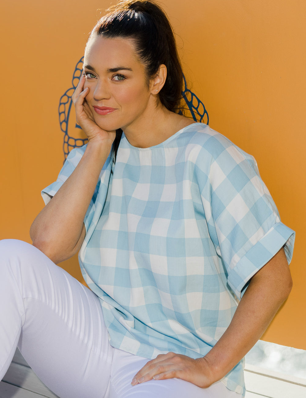 Model Laura wearing size 14 of the Gingham Top in colour Gingham (Blue), from the front, showing the whole outfit