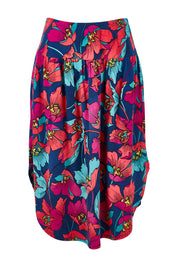 Product shot of the Elastic Waist Curved Hem Skirt in colour Lilly (Blue), from the front