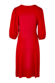 Product shot of the Gathered Waist Faux Wrap Dress in colour Flame (Red), from the back