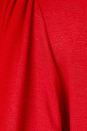 Product shot of the Gathered Waist Faux Wrap Dress in colour Flame (Red), detail
