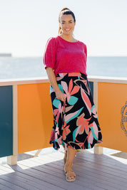 Model Laura wearing size 14 of the Printed Calf Length Full Skirt in colour Pastels (Blue), from the front, showing the whole outfit
