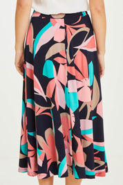 Model Stacey wearing size 10 of the Printed Calf Length Full Skirt in colour Pastels (Blue), from the back