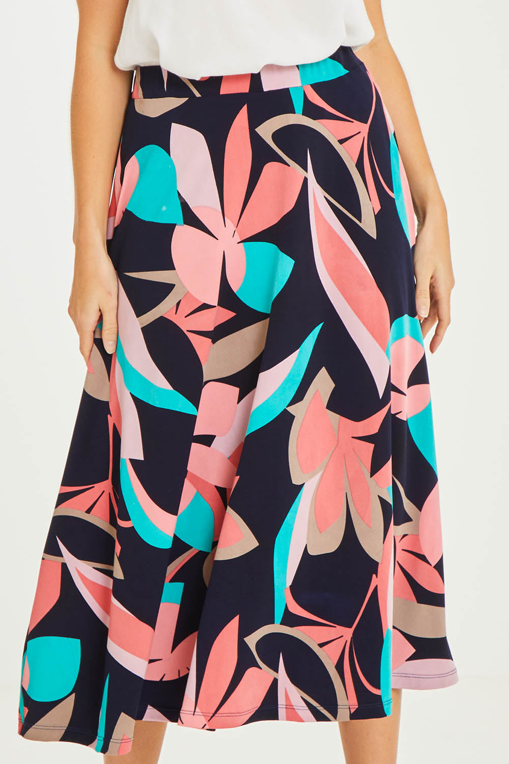 Model Stacey wearing size 10 of the Printed Calf Length Full Skirt in colour Pastels (Blue), from the front, cropped image
