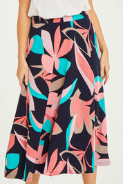 Model Stacey wearing size 10 of the Printed Calf Length Full Skirt in colour Pastels (Blue), from the front, cropped image