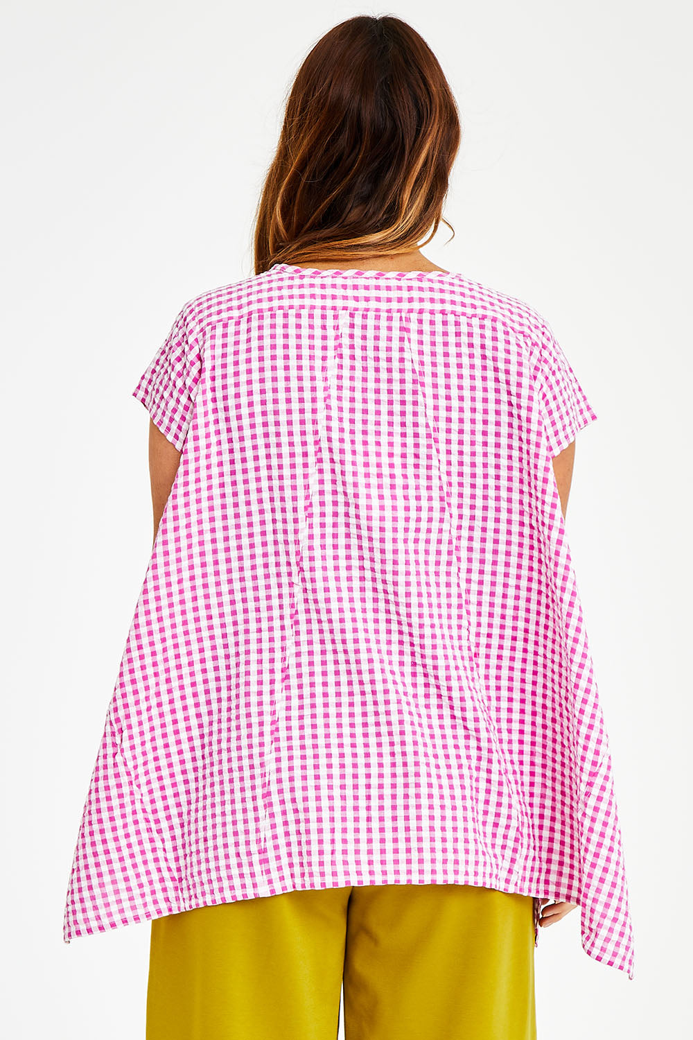 Model Laura wearing size 14 of the Gingham Drape Top in colour Gingham (Pink), from the back